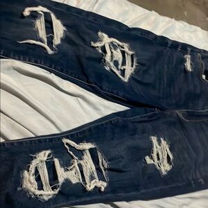 Women's Distressed Blue Jeans